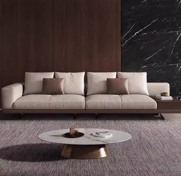 Sleek Leather Sofa With Wood Base and Side Table
